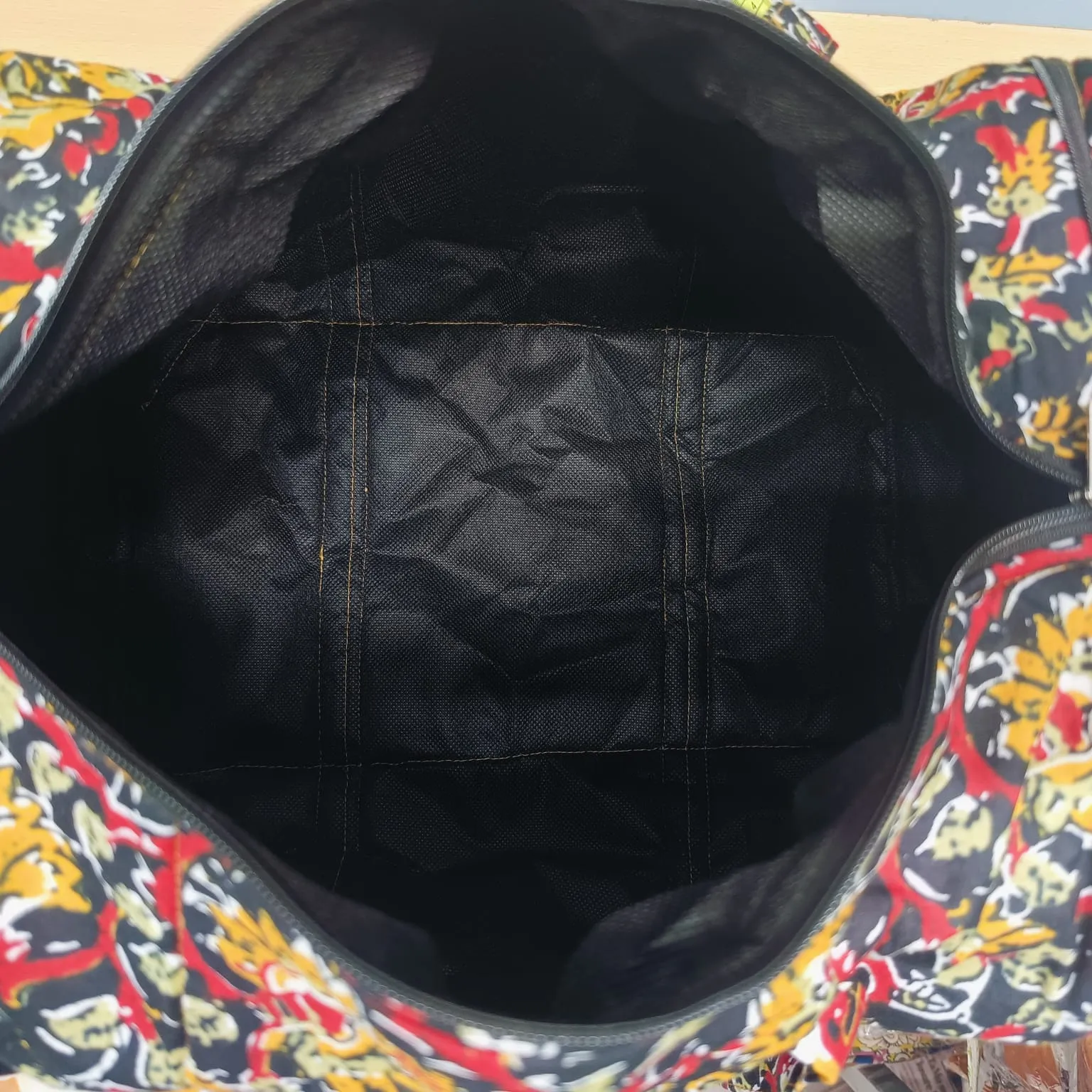 Expandable Travel Bag Brown Colour with Big White Leaf Design.